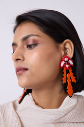 earrings in red color with orange-toned accents